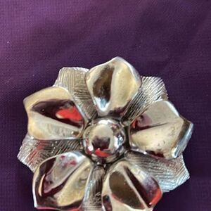 Silver flower brooch